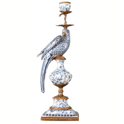 Blue and white candlestick right facing bird