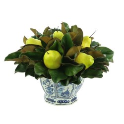 Gorgeous pear and magnolia midsized arrangement in blue/white pierced planter