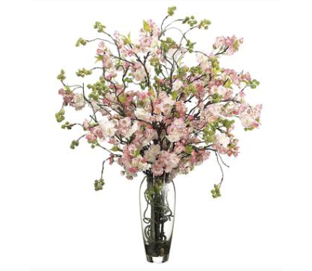 Amazing pink cherry blossom arrangement in glass vase
